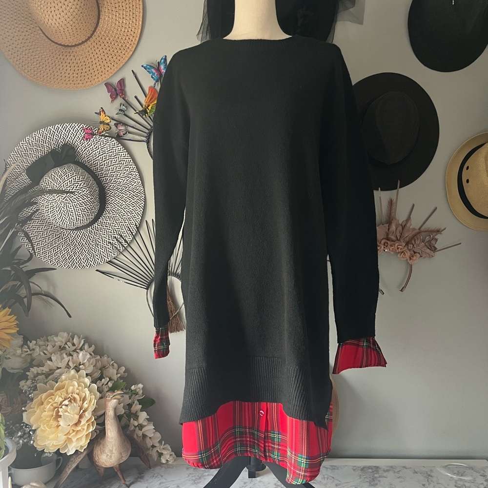 black sweater dress with cuffs and bottom trim.  New without tags.  Never worn.